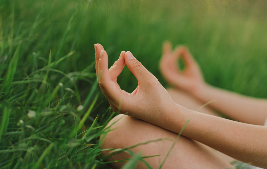 young girl doing yoga